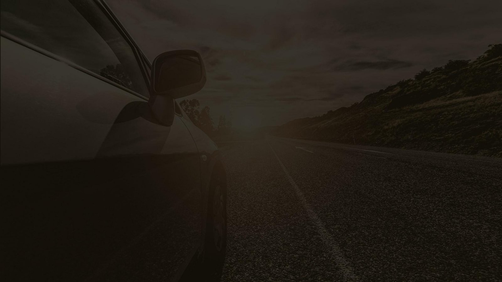 Gün batımı manzarasında yolculuk - özel ve güvenli araç transferi.